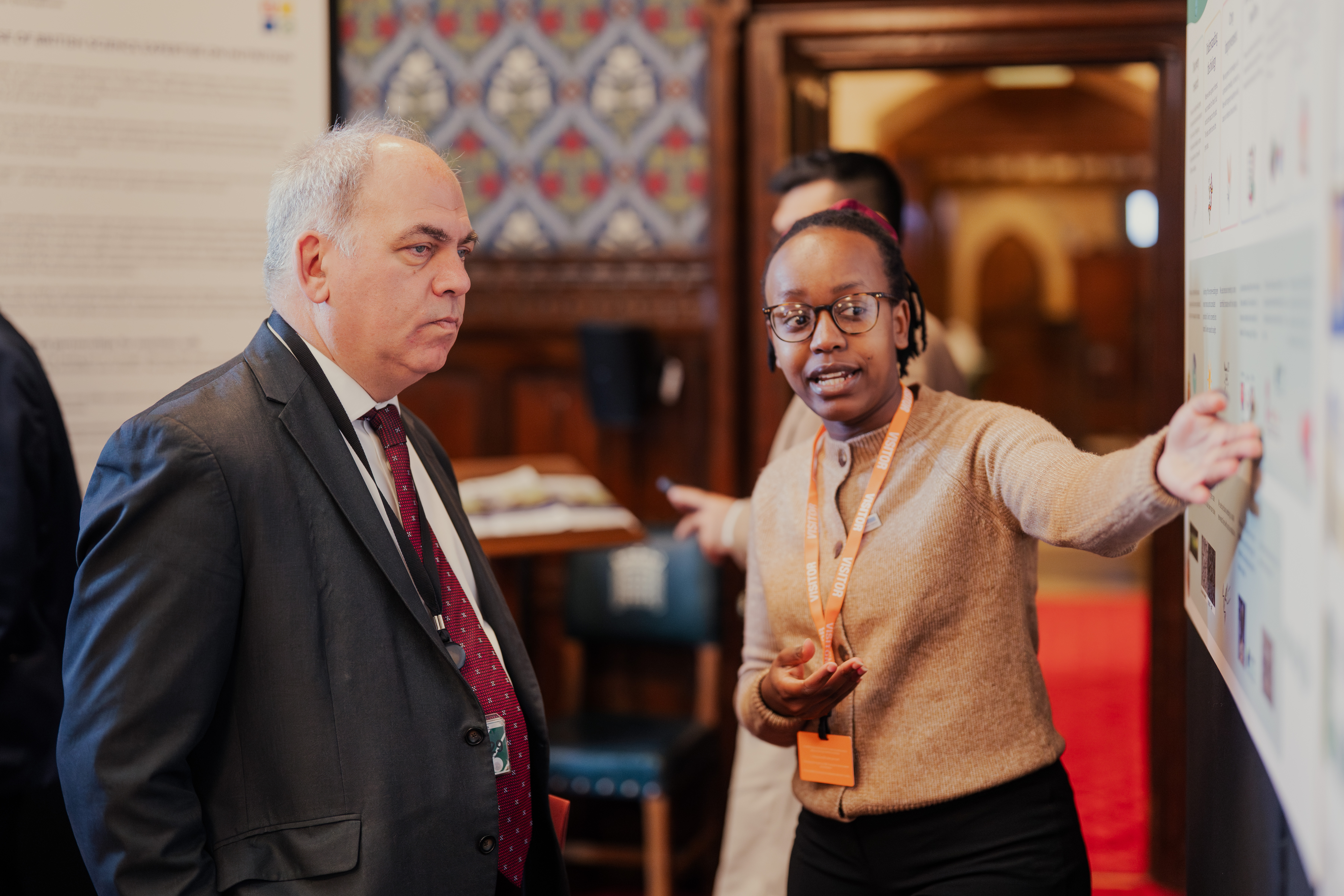 http://PhD%20student%20Brenda%20Mionki%20presenting%20her%20research%20to%20Bambos%20Charalambous%20MP%20at%20a%20Partliamentary%20event%20in%20Westminster,%20as%20part%20of%20British%20Science%20Week.
